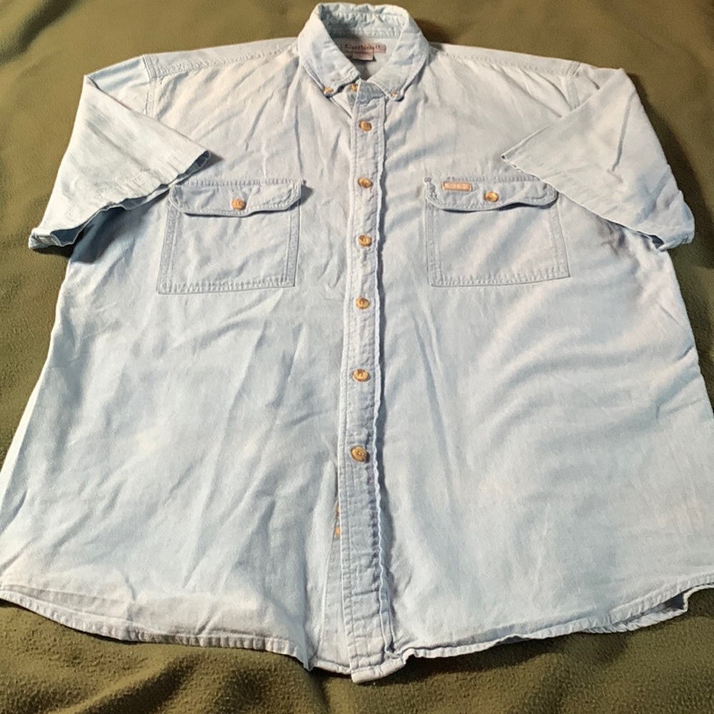 Men’s Carhartt blue, short sleeve, button up shirt.  Pockets on chest.  Size L.